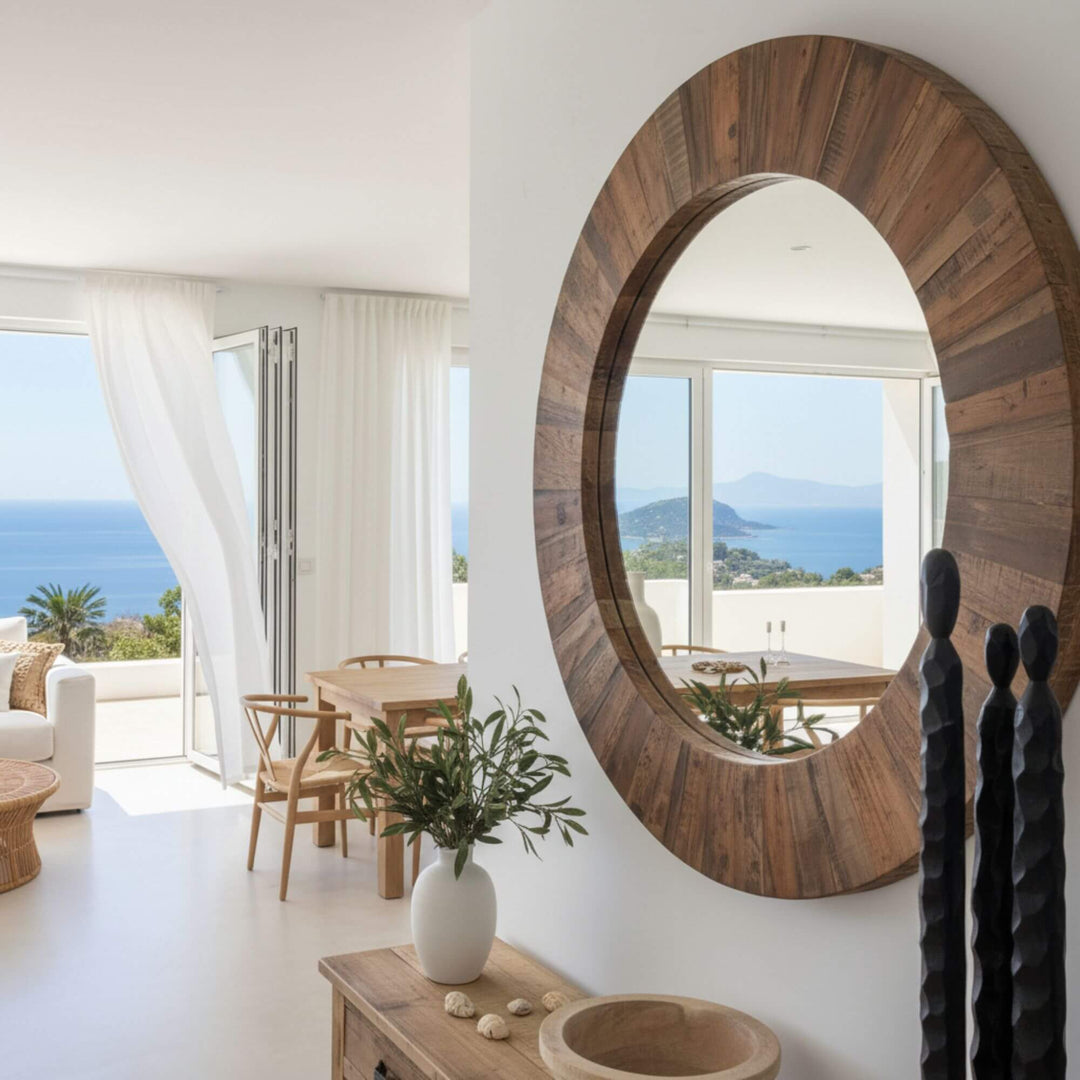 Front view of the Saona Round Mirror crafted from natural reclaimed wood and glass.