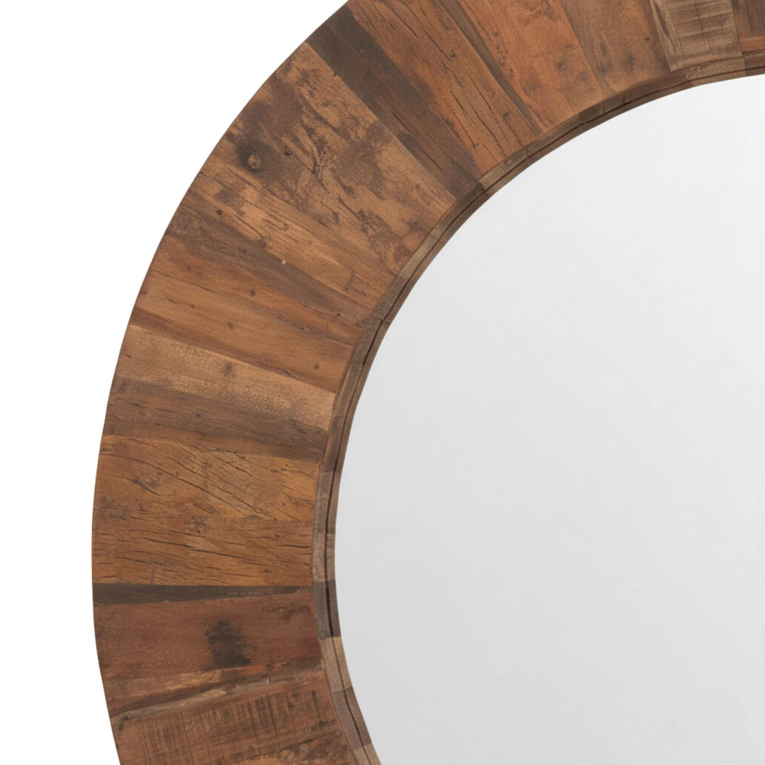 Detail of the circular wooden frame of the Saona Round Mirror.
