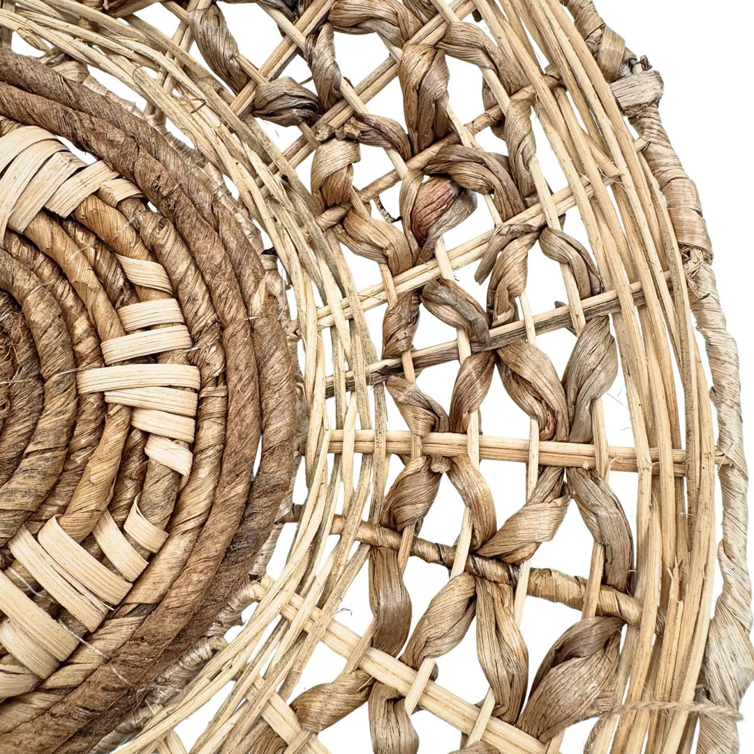 Close-up of woven rattan and banana fiber detail on Sarakiniko Wall Deco Plate