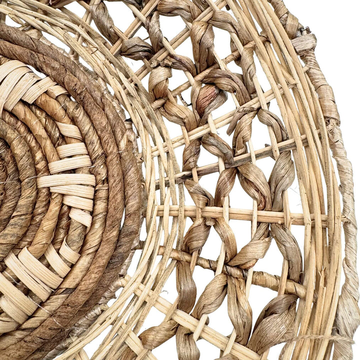 Close-up of woven rattan and banana fiber detail on Sarakiniko Wall Deco Plate