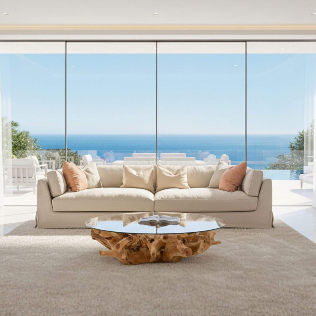 Sardegna beige linen sofa in coastal living room with sea view and natural wood coffee table