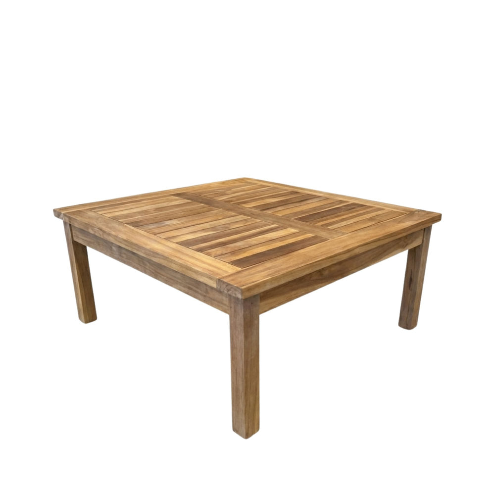 Angled view of Sasso Coffee Table made from solid teak wood with a square silhouette.