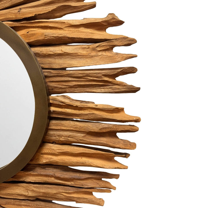 Side view of the Savaii Round Mirror showing layered teak wood pieces around the circular glass.