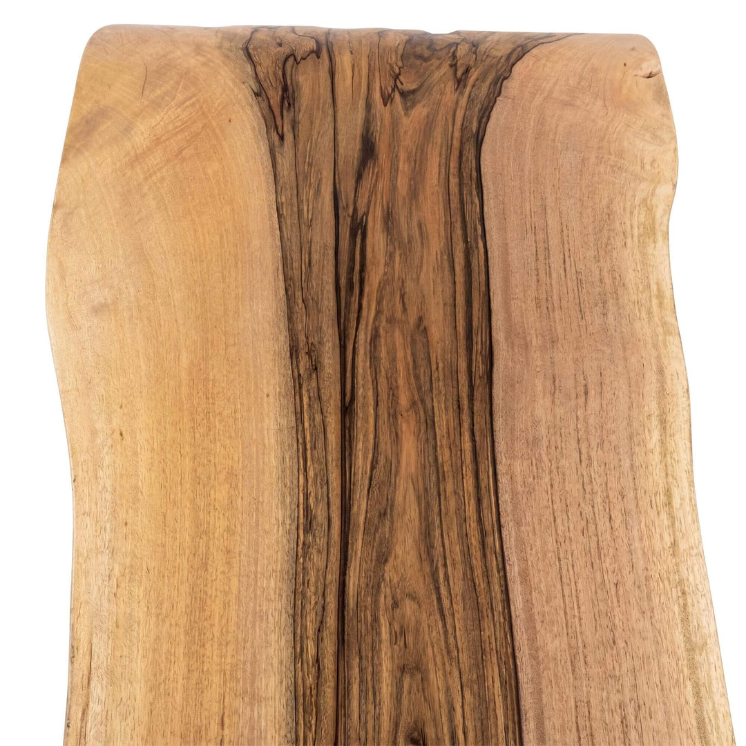 Close-up of the tabletop surface highlighting the flowing wood grain and warm natural tones.