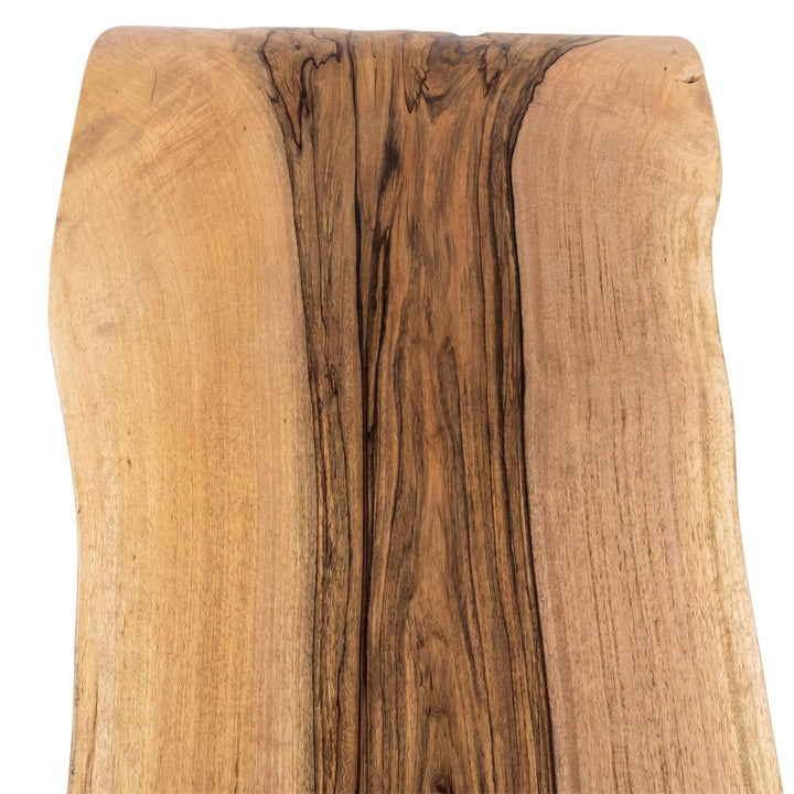 Close-up of the tabletop surface highlighting the flowing wood grain and warm natural tones.