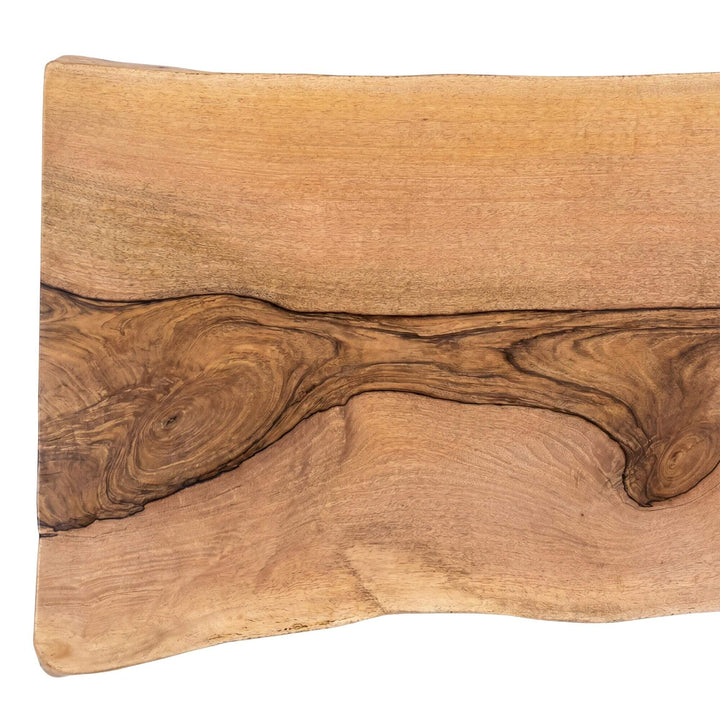 Top view of the table showing the long natural grain pattern and tonal variation across the wood surface.