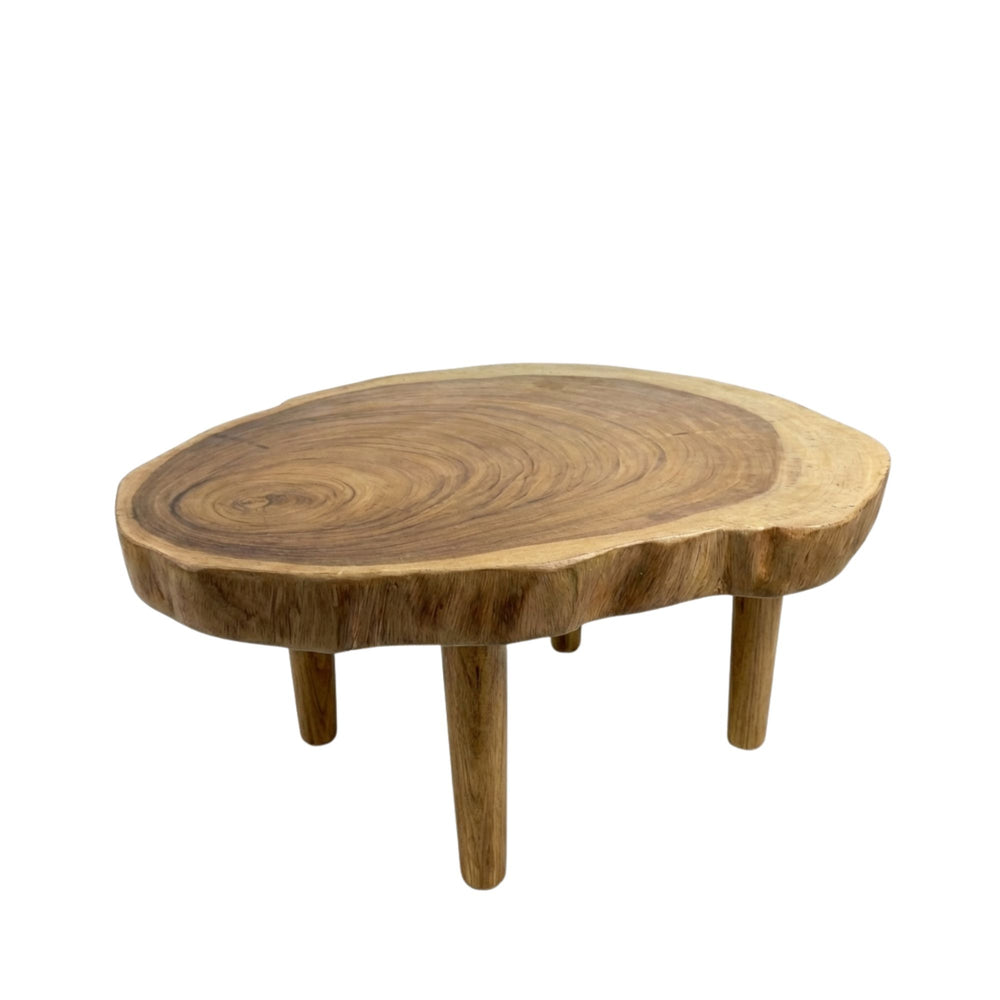 Front view of Savu Coffee Table made from solid suar wood with a rounded silhouette and sturdy legs.
