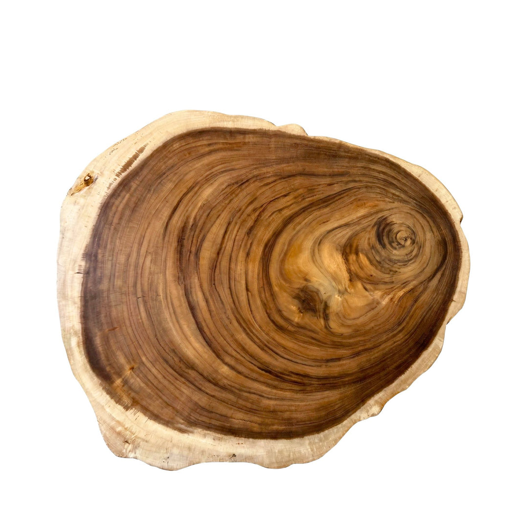 Top view of the table highlighting the rich suar wood grain and rounded organic silhouette.