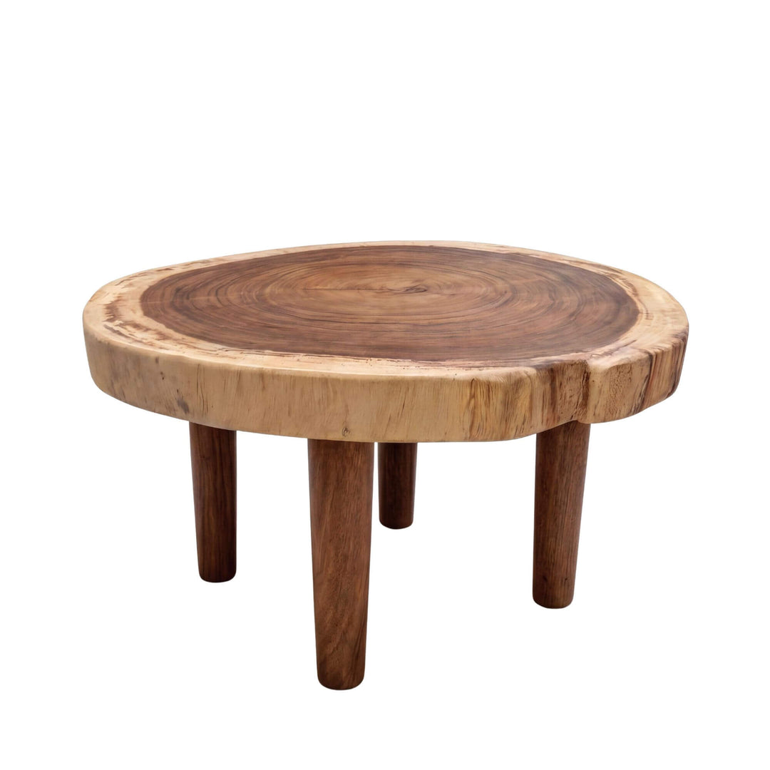 Front view of the Savu coffee table showing its rounded solid suar wood top and sturdy wooden legs.