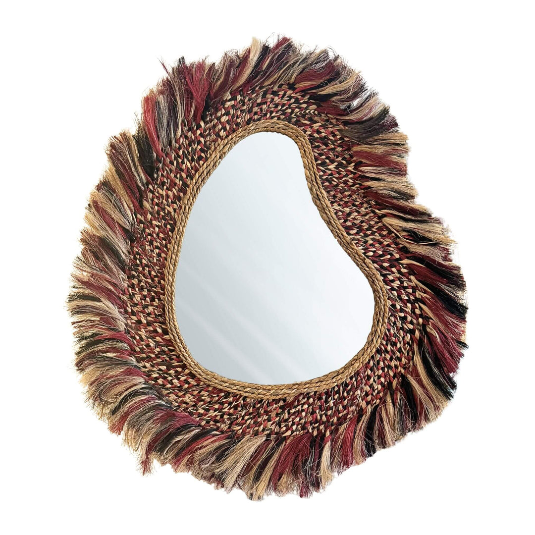Sawana Mirror made of abaca, sisal, and cotton with an organic frame and multicolor accents, available in two sizes.