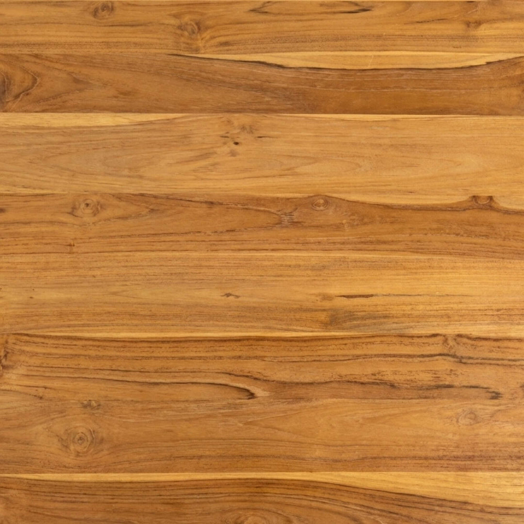 Close-up detail of the natural teak wood grain on the desktop surface.