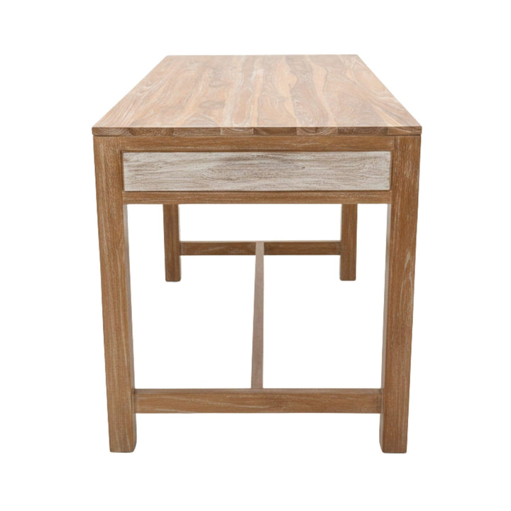 Side view of the whitewashed teak desk showing the solid frame.