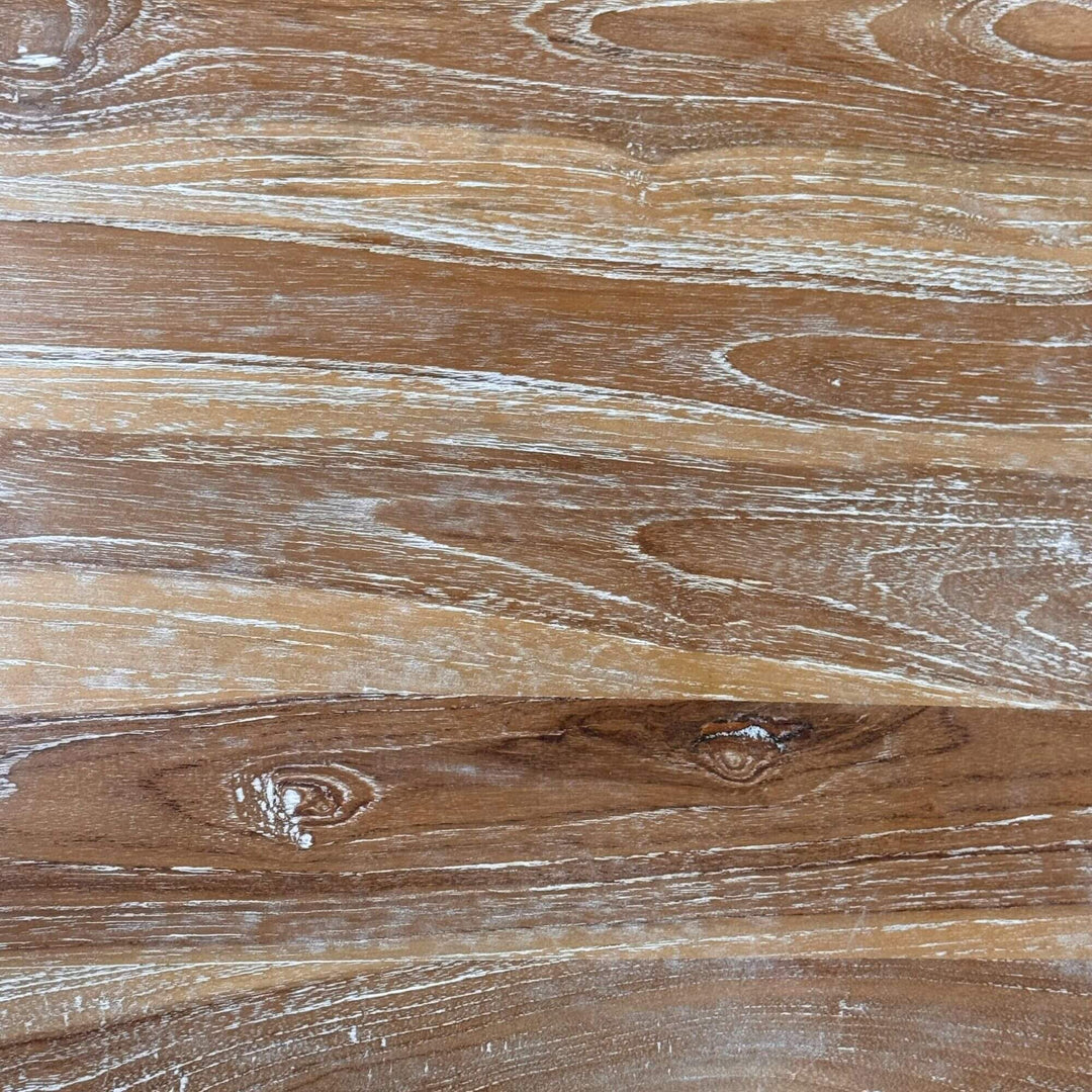Close-up of the whitewashed teak wood texture of the Scheherazade Desk.