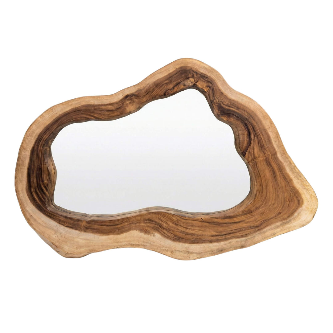 Front view of the Sebirut mirror showing its organic suar wood frame and irregular natural shape.