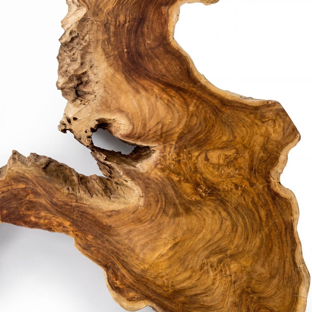 Close-up detail of the reclaimed teak wood surface showing the rich grain and natural organic contours.