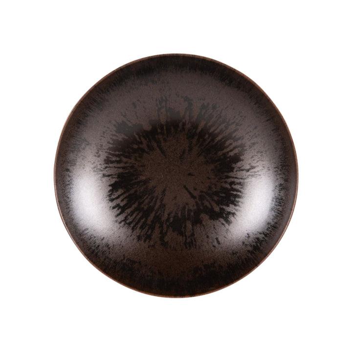 Top view of dark brown ceramic plate with handcrafted glaze texture.