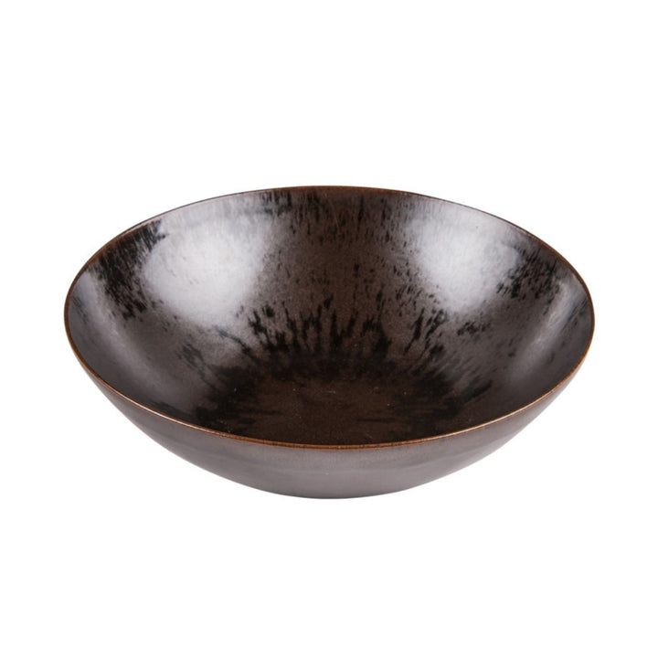 Ceramic Saladier from the Sebuku Brown collection showing organic shape and finish.