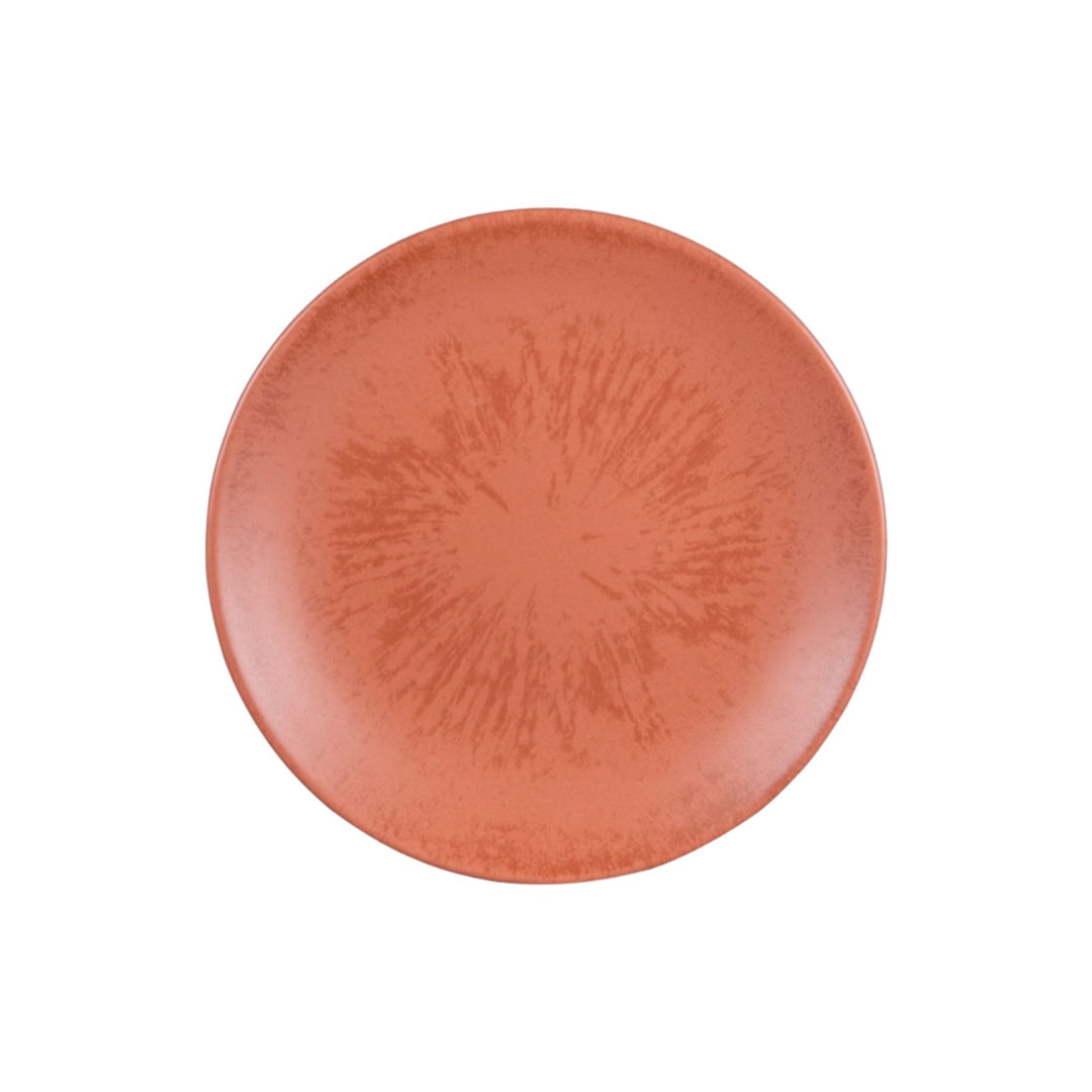 Top view of terracotta ceramic dessert plate with handcrafted surface texture.
