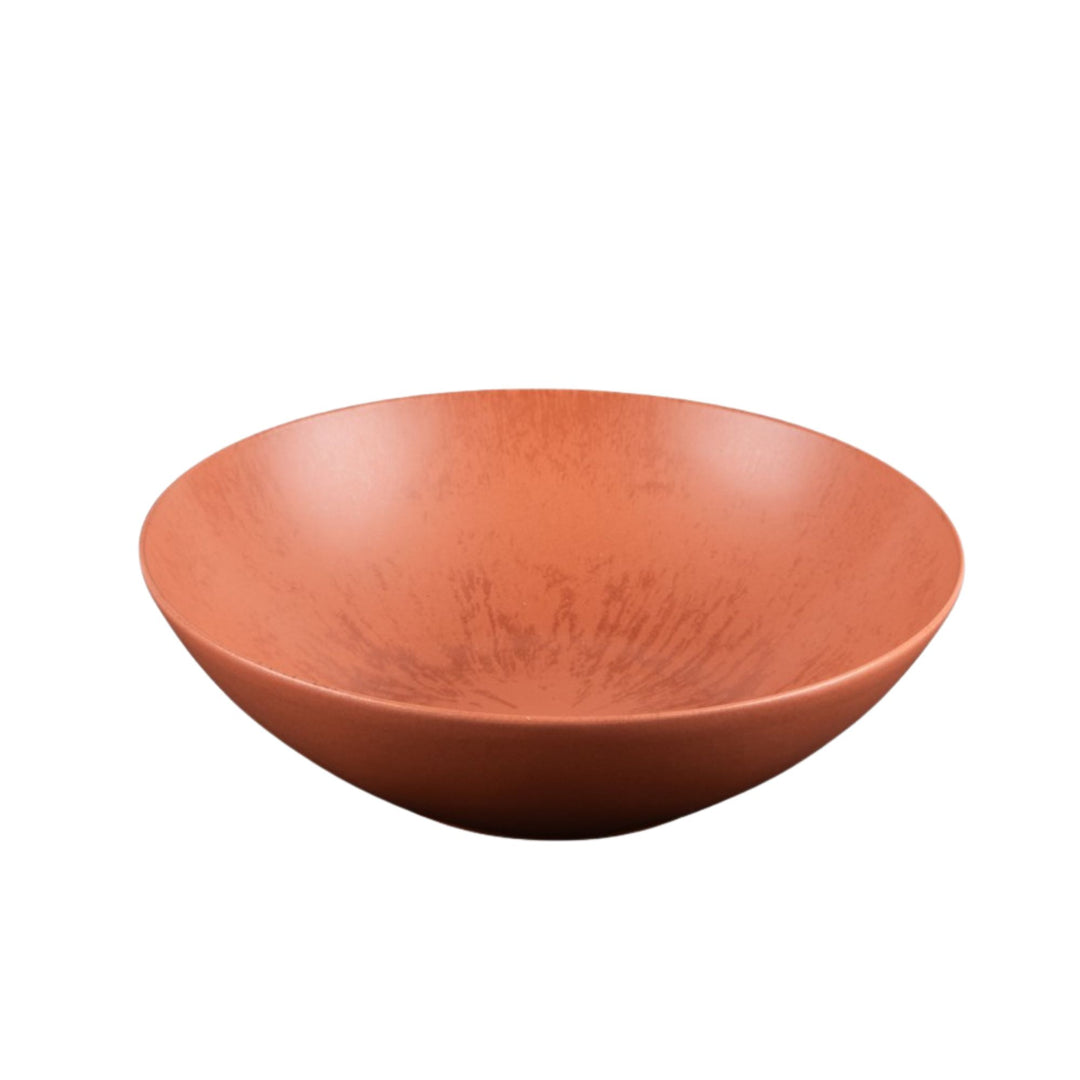 Ceramic Saladier from the Sebuku Terra collection showing organic shape and glaze.