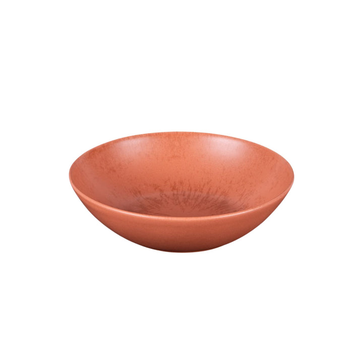 Ceramic Small bowl from the Sebuku Terra collection showing organic shape and glaze.