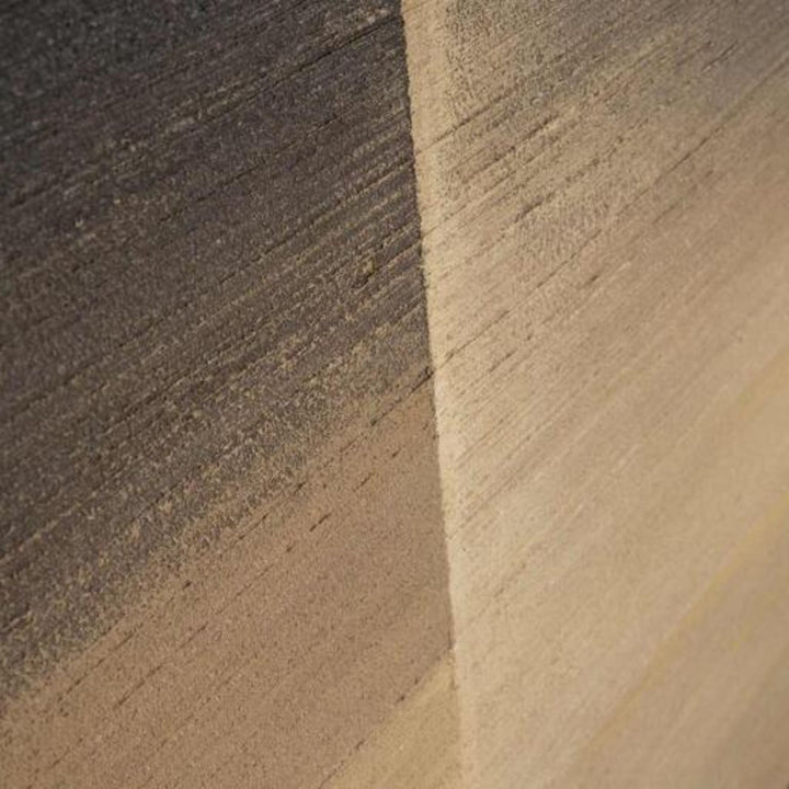 Close-up of the hand-painted abstract composition in dark brown, beige, and natural tones.