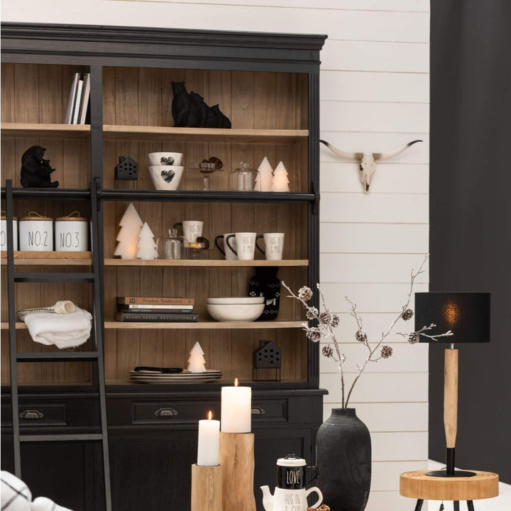Styled living room wall with Sherlock rack filled with décor
