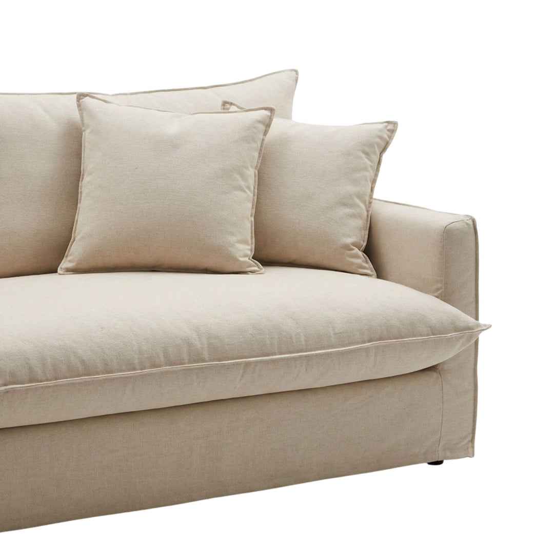 Detail view of the armrest and back cushions emphasizing comfort and clean lines.