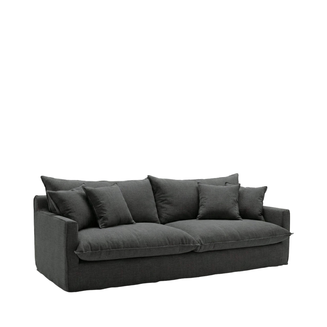 Front view of the Sicilia sofa showcasing its relaxed silhouette and soft upholstered cushions.