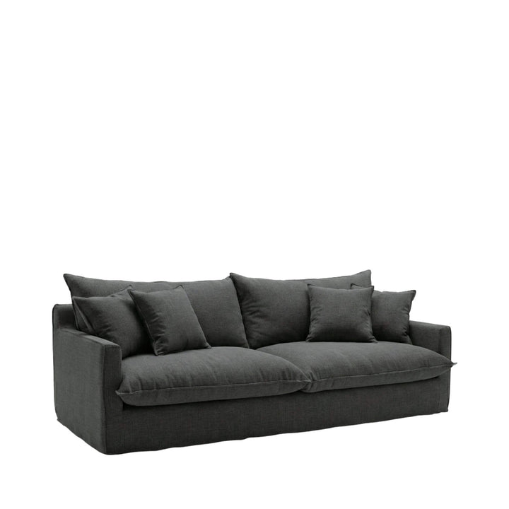 Front view of the Sicilia sofa showcasing its relaxed silhouette and soft upholstered cushions.