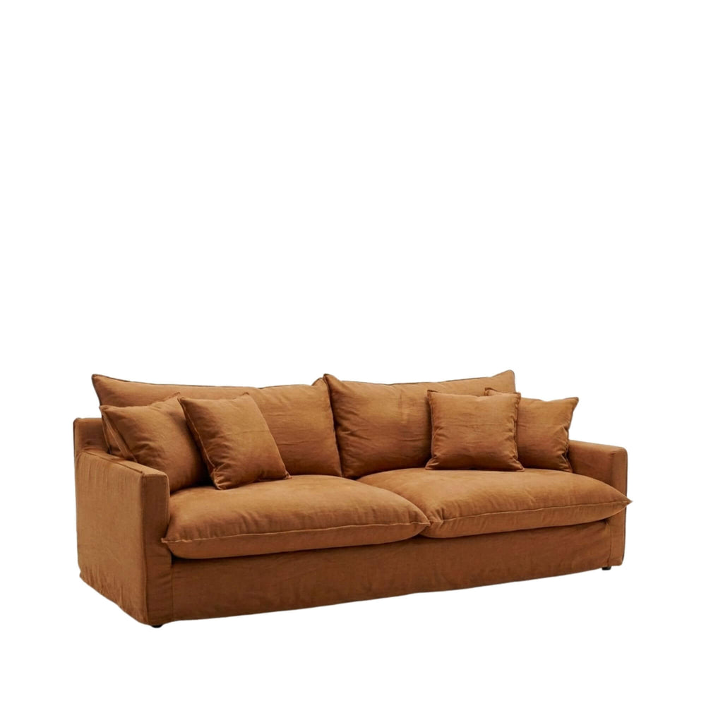Front view of the Sicilia sofa showcasing its relaxed silhouette and soft upholstered cushions.