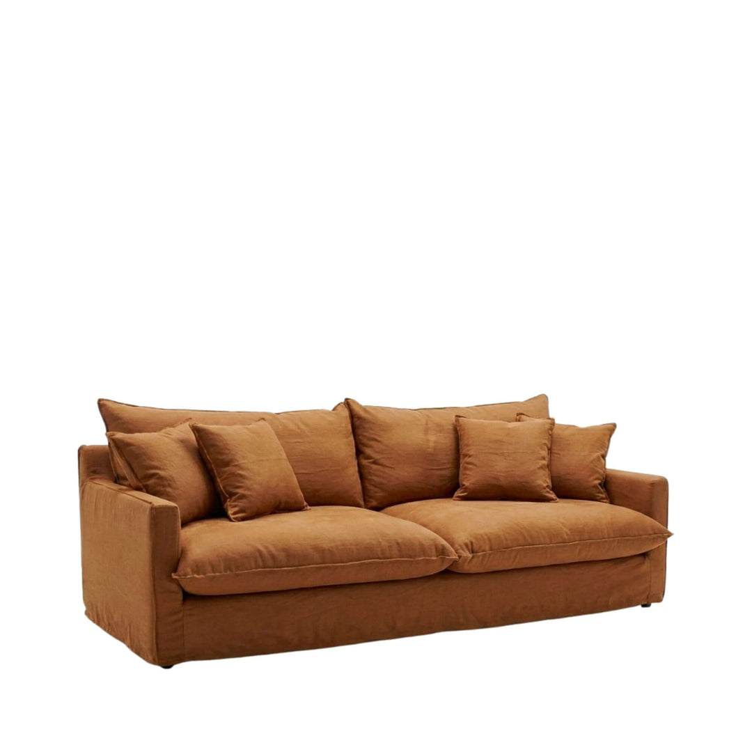 Front view of the Sicilia sofa showcasing its relaxed silhouette and soft upholstered cushions.