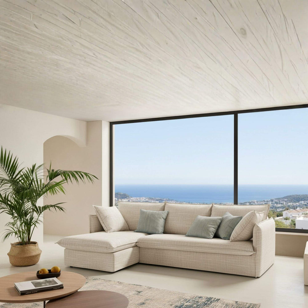 Sicilia sectional sofa bed with chaise longue in bright coastal room.