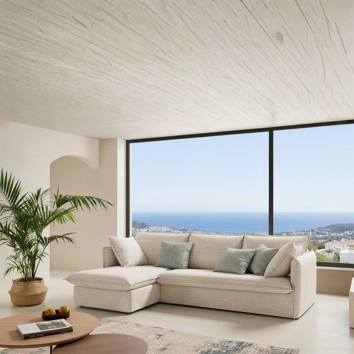 Sicilia sectional sofa bed with chaise longue in bright coastal room.