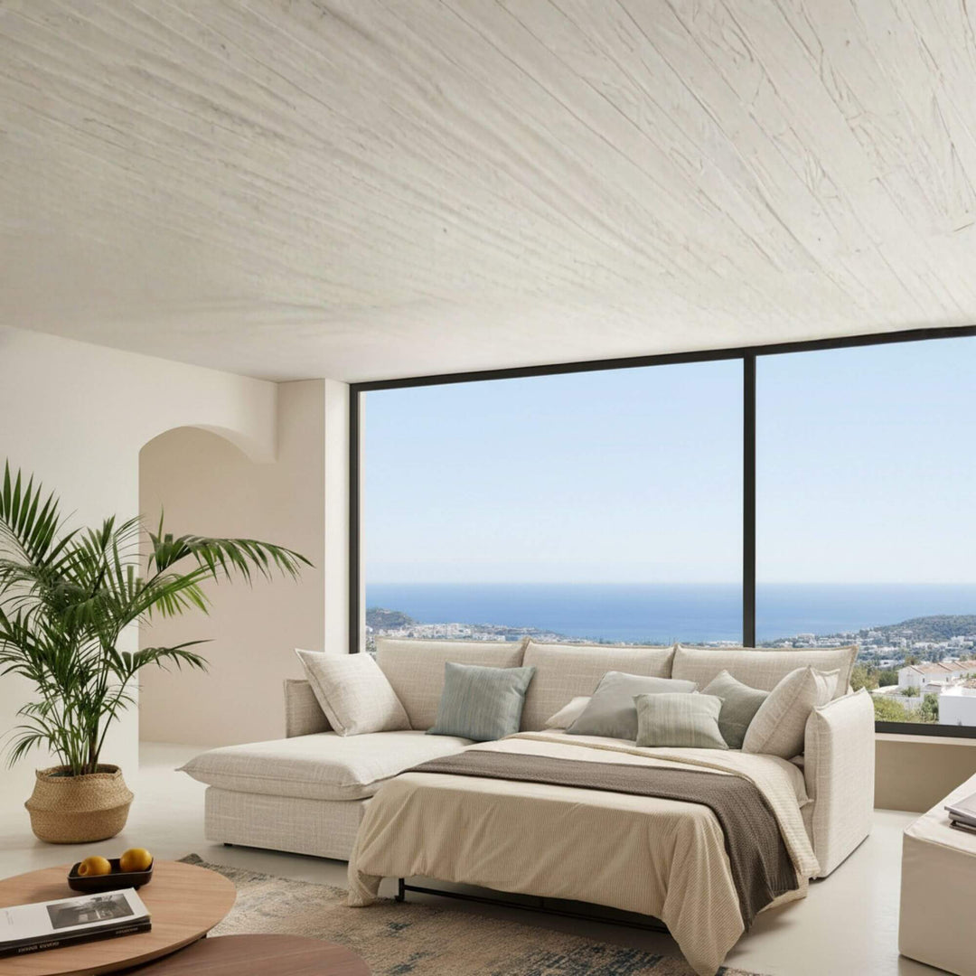 Sicilia sectional sofa bed with chaise longue in bright coastal room.