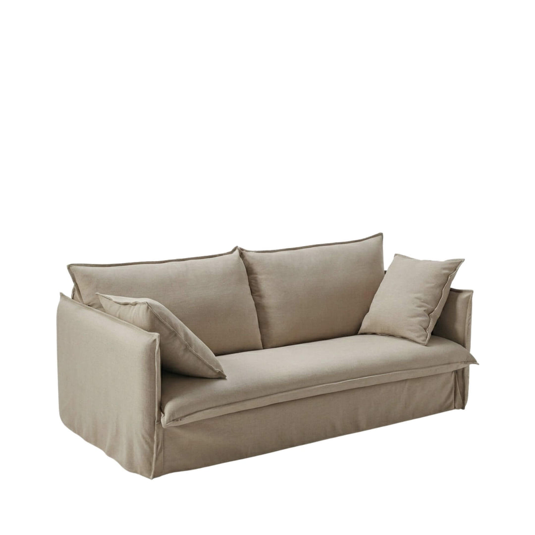 Angled view of the Sicilia sofa bed in sofa position, showcasing its clean lines and upholstered design.