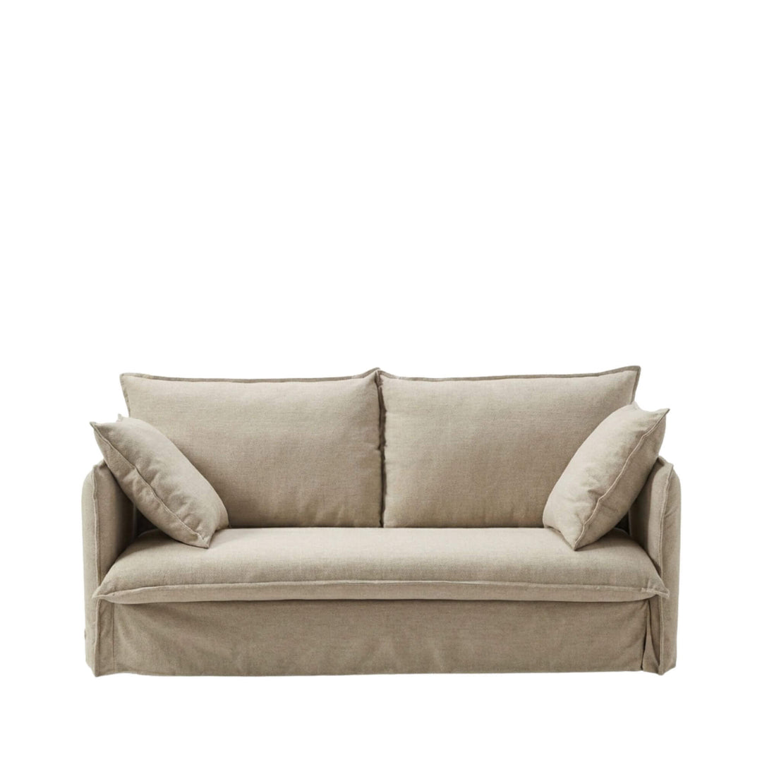 Front view of the Sicilia sofa bed in sofa position, showcasing its clean lines and upholstered design.