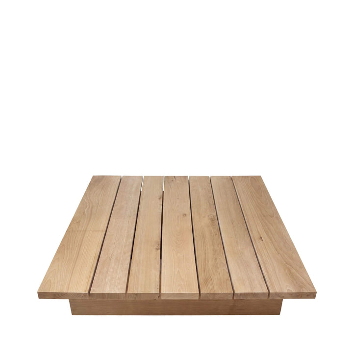Front view of the coffee table highlighting its rectangular shape and evenly spaced wooden slats.