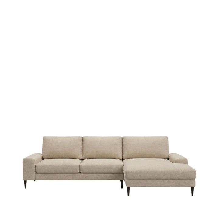 Front view of the Siena sofa in beige fabric highlighting its relaxed silhouette.
