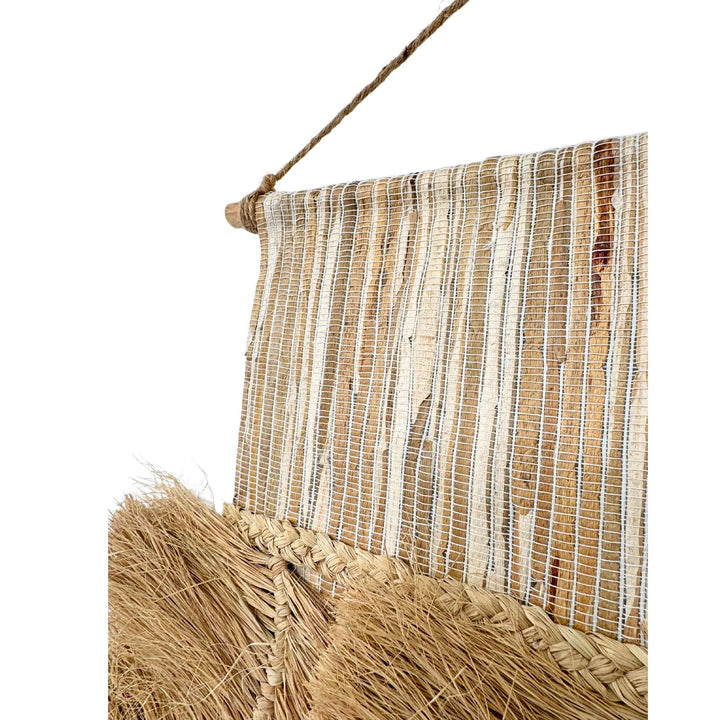 Side view of Sika Wall Deco highlighting artisanal craftsmanship in sisal and banana leaf