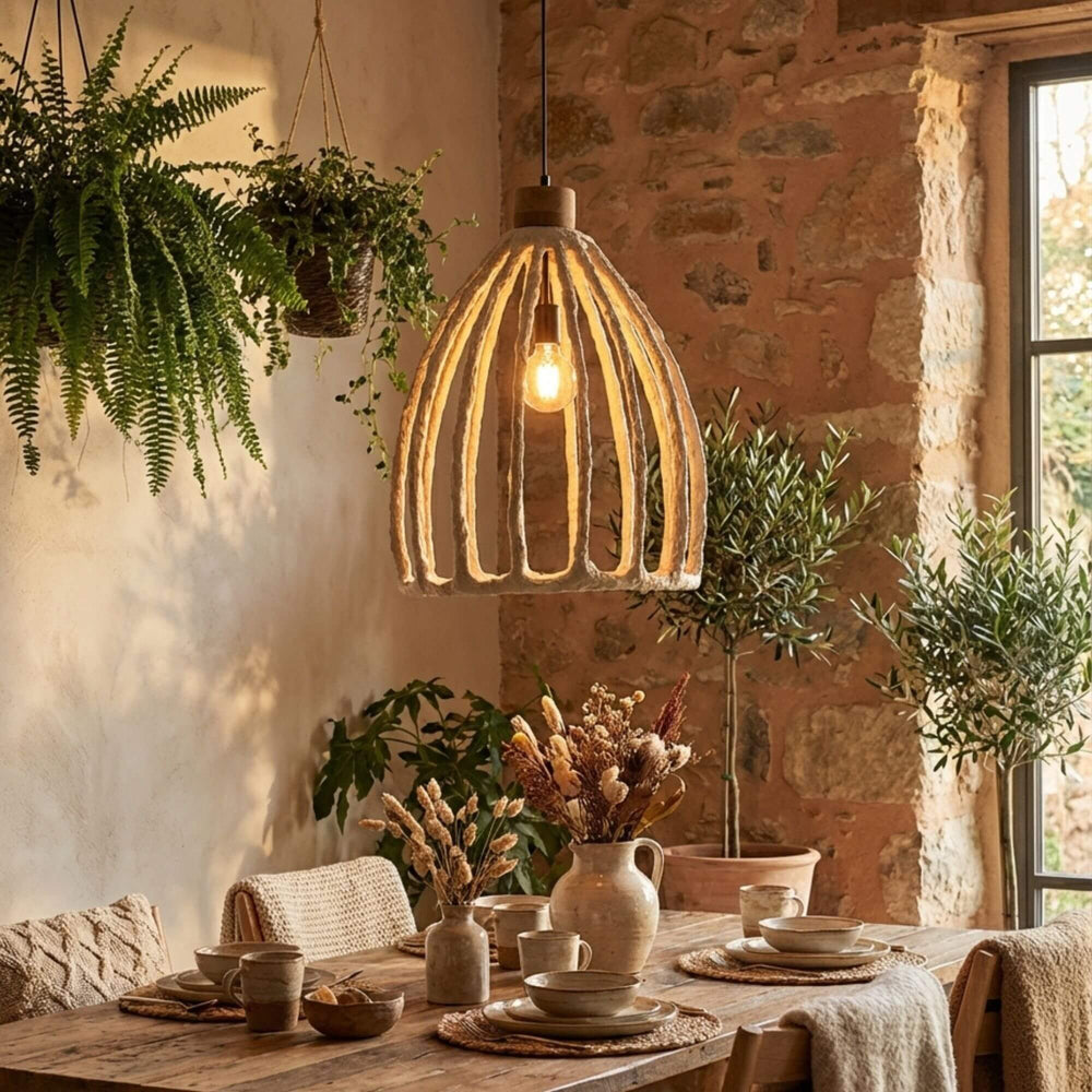 Interior styling scene featuring the Skele ceiling lamp above a dining table with warm ambient light.