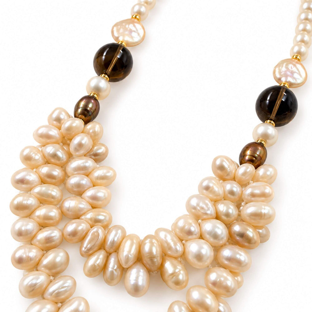 Close-up of layered drop pearls and smoky quartz details on the Smoky Pearl Cascade Necklace