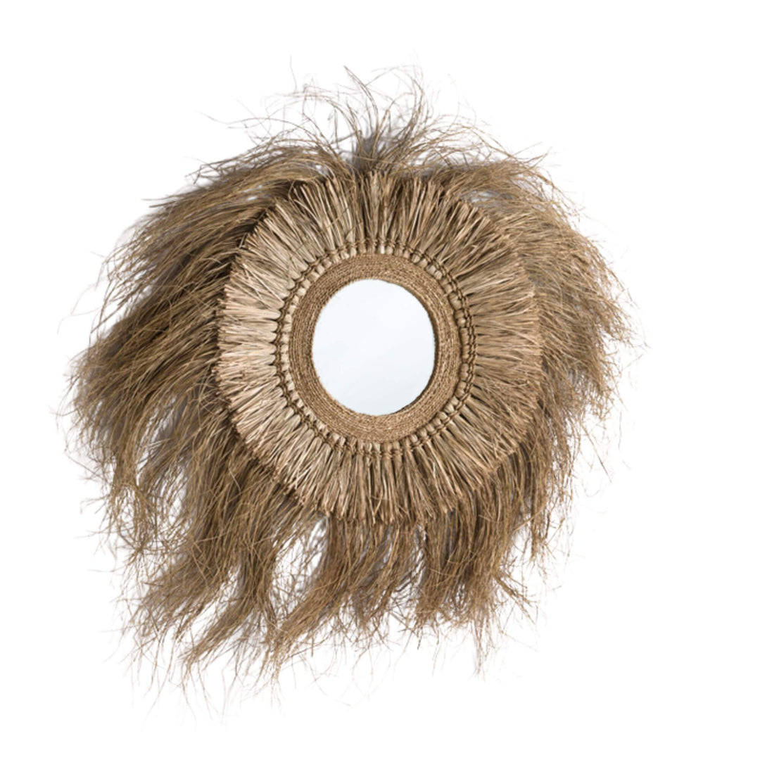 Socotra round mirror with natural seagrass frame and textured organic edges.