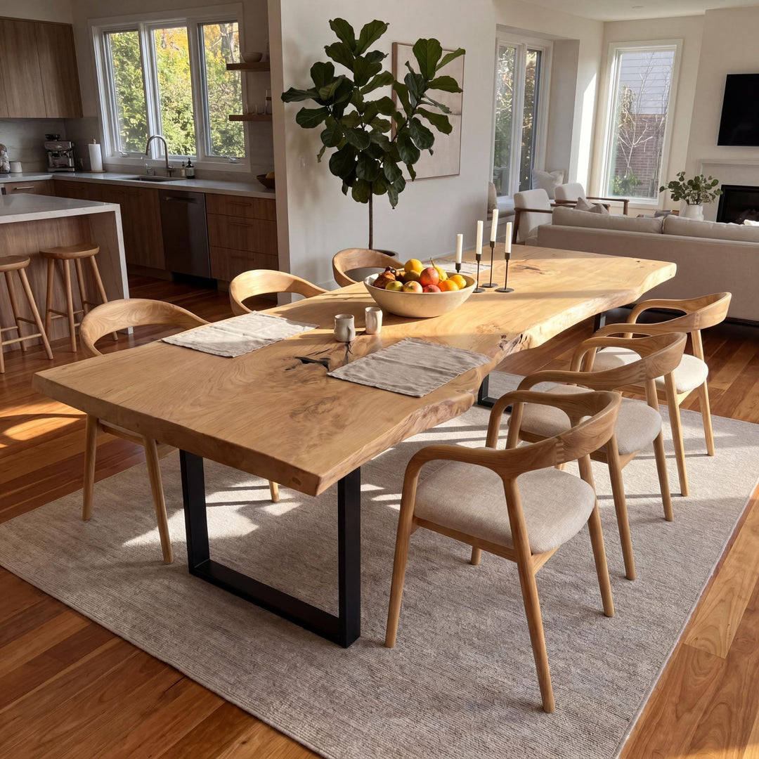 Styled dining room setting featuring the Sora dining chairs around a wooden table in a warm natural interior.