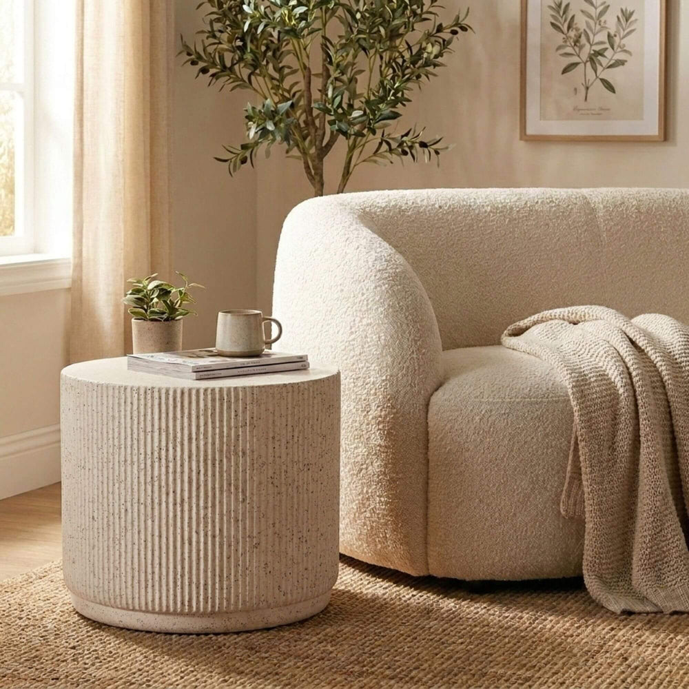 Styled interior setting featuring the stone look coffee table in a warm natural living room.