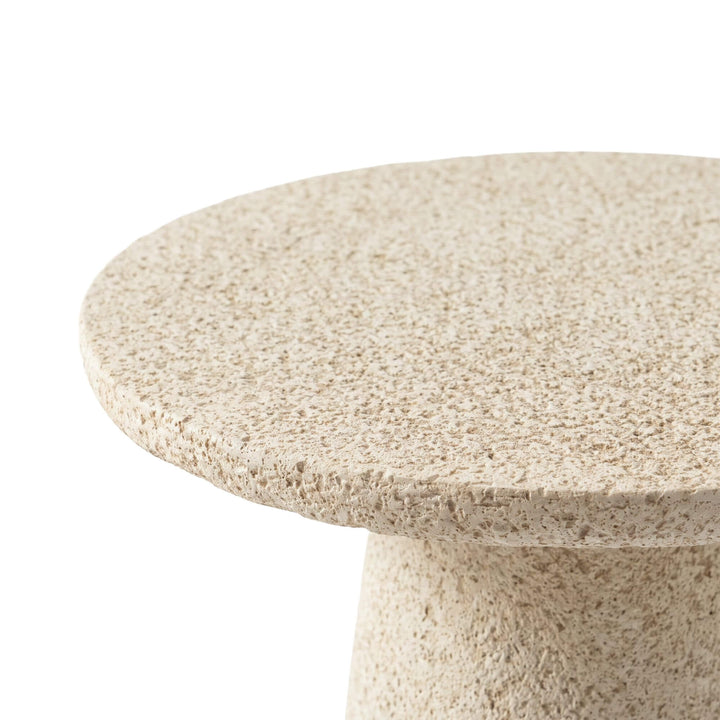 Close-up of the Stone Look side table highlighting its textured mineral-style surface and rounded edge