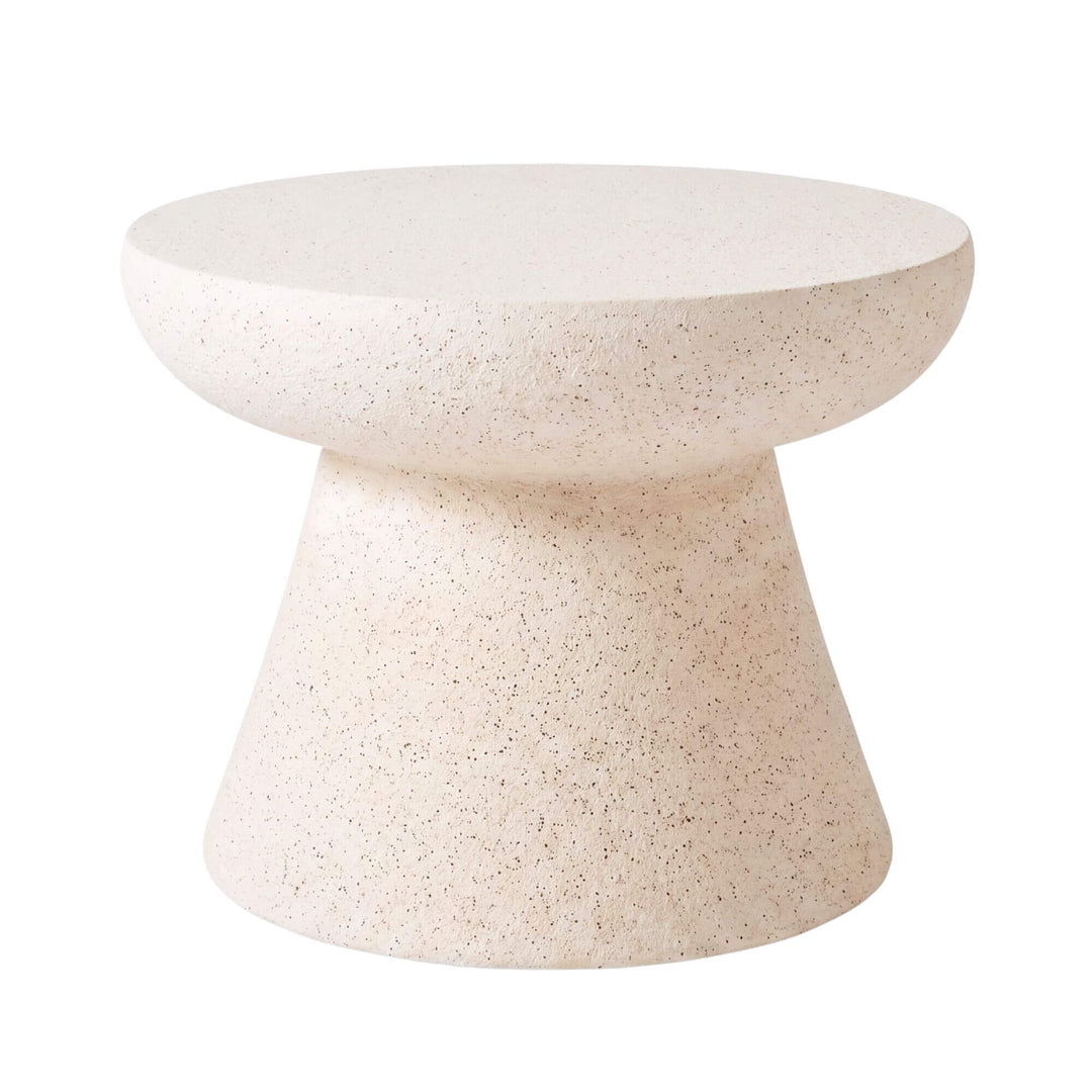 Front view of the stone look side table showing its rounded top and sculptural pedestal base.