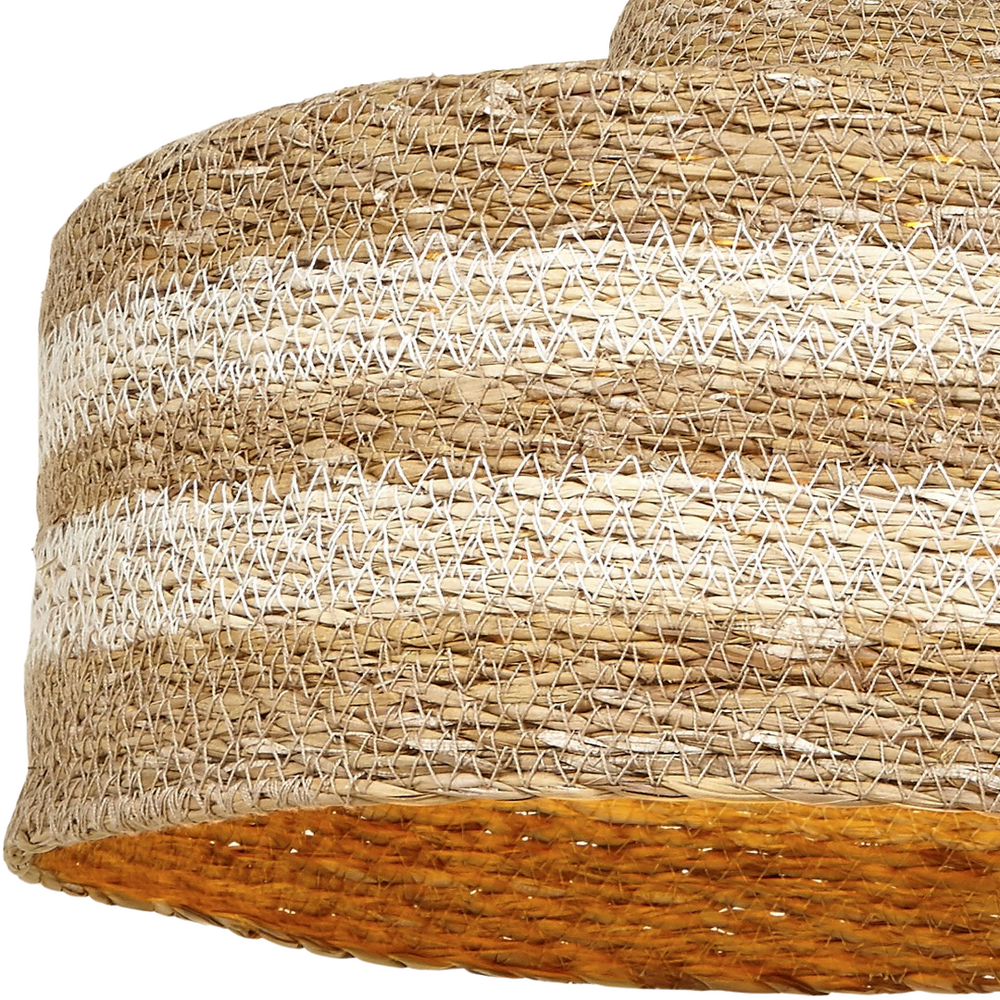 Close-up of striped straw weave texture on pendant shade.