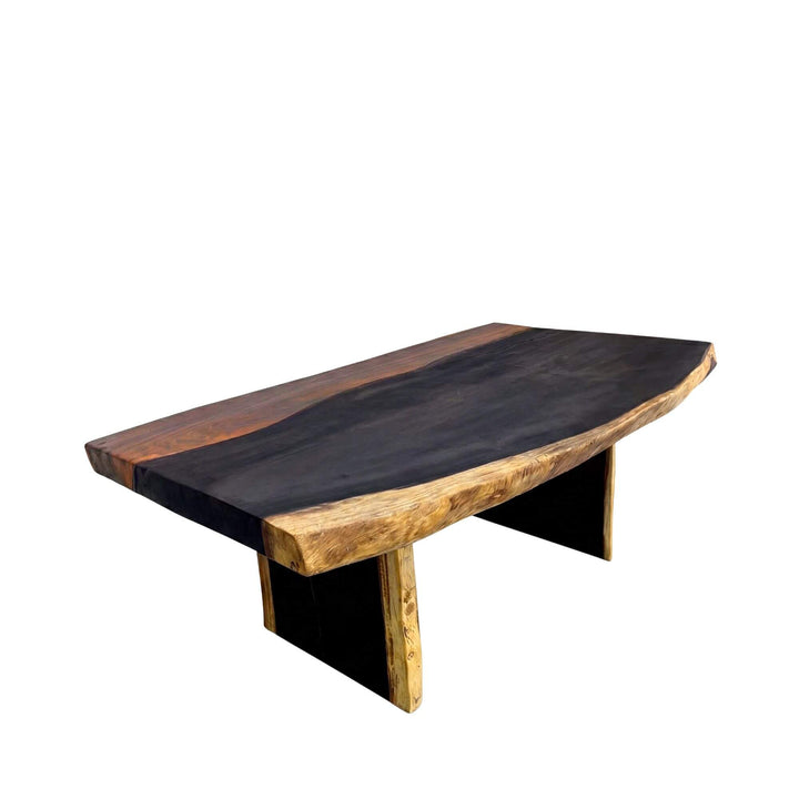 Front view of the Suar Lake wood dining table showing its solid suar wood top and dark contrasting center detail.