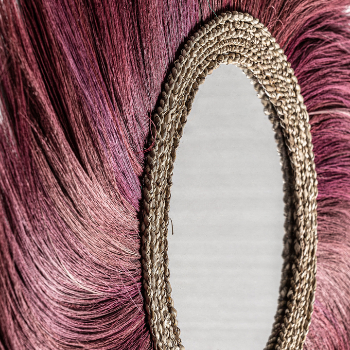 Side angle view emphasizing the depth and layered fiber construction of the mirror.