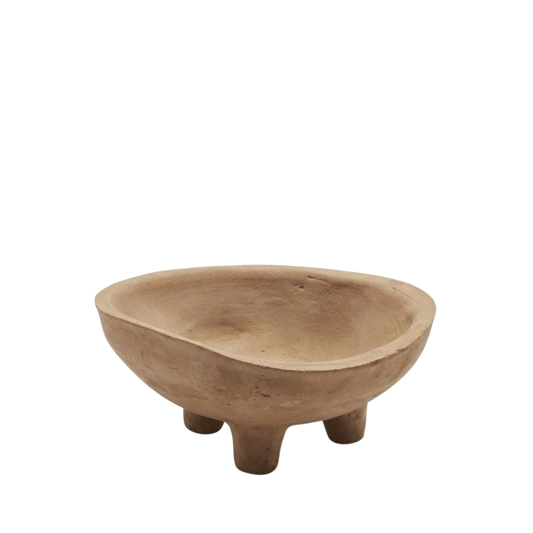 Front view of the Sula terracotta bowl with rounded shape and three small feet.